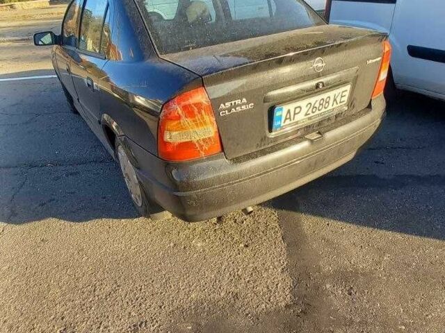 Черный Опель Астра, объемом двигателя 1.4 л и пробегом 169 тыс. км за 4650 $, фото 18 на Automoto.ua