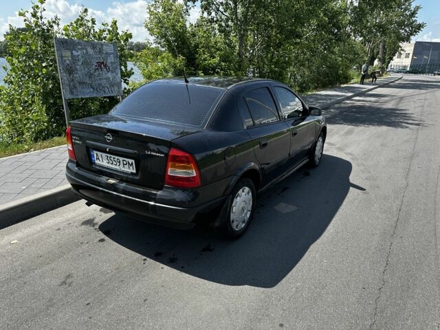 Черный Опель Астра, объемом двигателя 1.4 л и пробегом 191 тыс. км за 3000 $, фото 6 на Automoto.ua