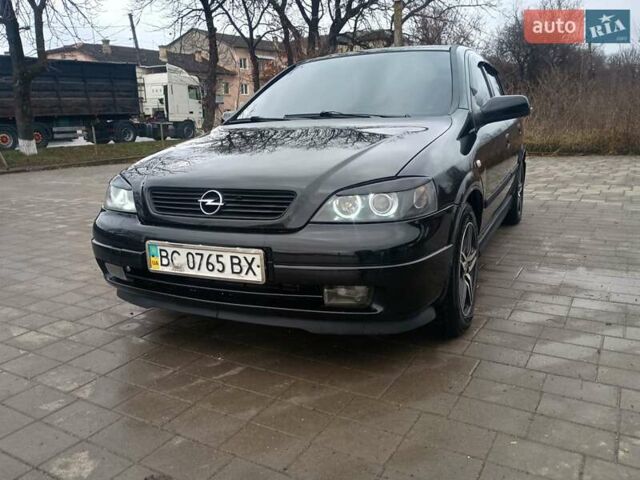Чорний Опель Астра, об'ємом двигуна 1.4 л та пробігом 222 тис. км за 3400 $, фото 5 на Automoto.ua