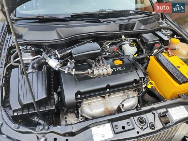 Черный Опель Астра, объемом двигателя 1.6 л и пробегом 100 тыс. км за 2800 $, фото 9 на Automoto.ua