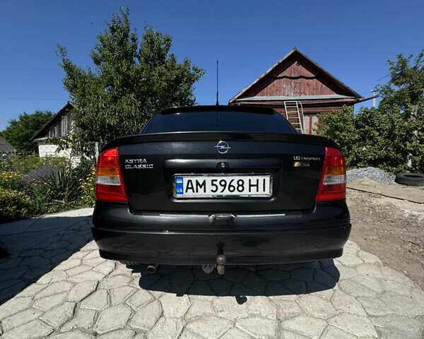 Черный Опель Астра, объемом двигателя 1.6 л и пробегом 262 тыс. км за 4500 $, фото 3 на Automoto.ua