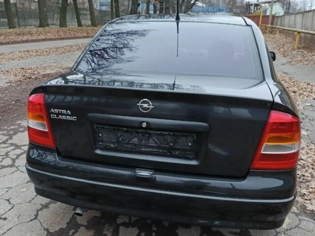 Черный Опель Астра, объемом двигателя 1.4 л и пробегом 175 тыс. км за 148000 $, фото 3 на Automoto.ua