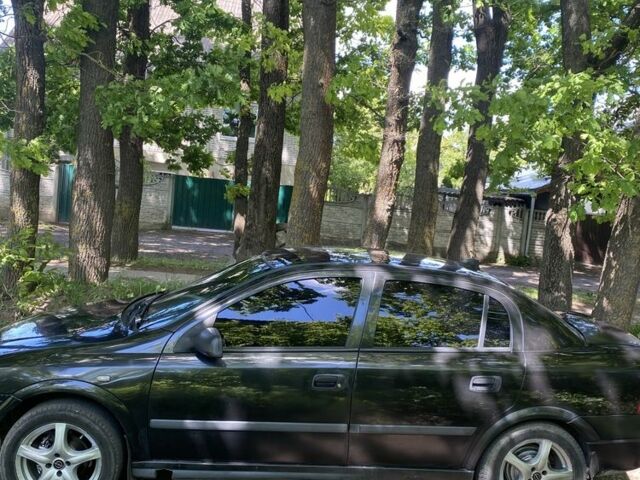 Черный Опель Астра, объемом двигателя 1.6 л и пробегом 470 тыс. км за 3000 $, фото 3 на Automoto.ua