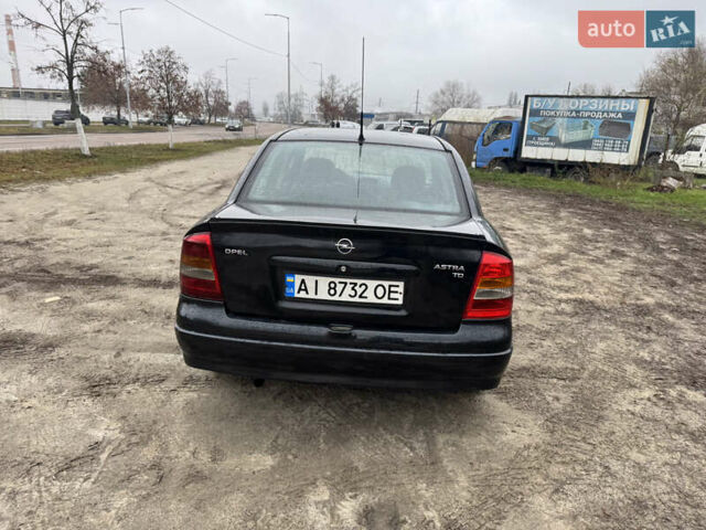 Черный Опель Астра, объемом двигателя 1.7 л и пробегом 300 тыс. км за 2999 $, фото 8 на Automoto.ua