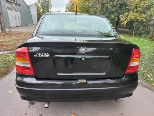 Черный Опель Астра, объемом двигателя 0 л и пробегом 220 тыс. км за 4500 $, фото 5 на Automoto.ua