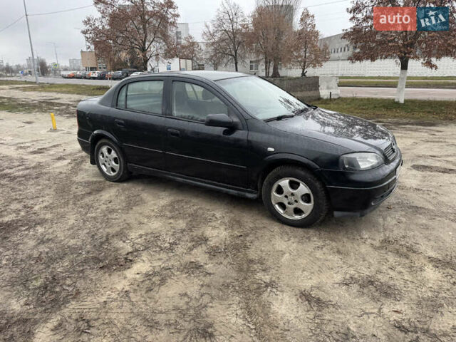 Черный Опель Астра, объемом двигателя 1.7 л и пробегом 300 тыс. км за 2999 $, фото 3 на Automoto.ua