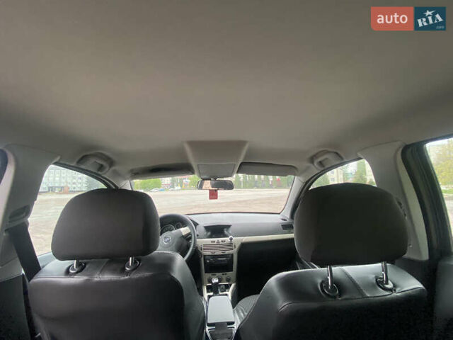 Черный Опель Астра, объемом двигателя 1.6 л и пробегом 230 тыс. км за 3900 $, фото 7 на Automoto.ua
