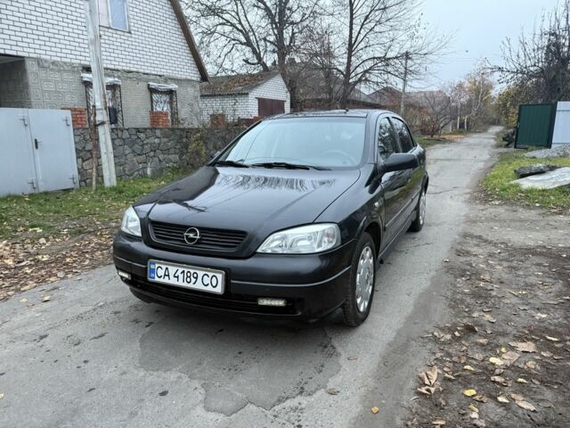 Черный Опель Астра, объемом двигателя 1.6 л и пробегом 250 тыс. км за 3750 $, фото 13 на Automoto.ua