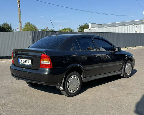 Чорний Опель Астра, об'ємом двигуна 1.6 л та пробігом 176 тис. км за 4700 $, фото 4 на Automoto.ua