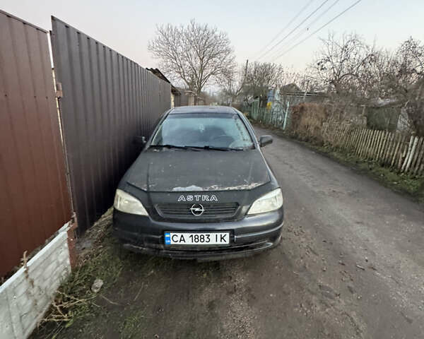 Черный Опель Астра, объемом двигателя 1.6 л и пробегом 240 тыс. км за 2500 $, фото 8 на Automoto.ua