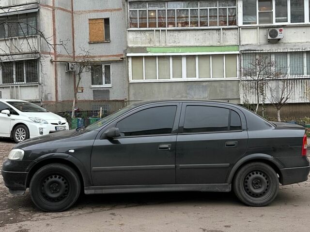 Черный Опель Астра, объемом двигателя 1.6 л и пробегом 149 тыс. км за 2900 $, фото 4 на Automoto.ua