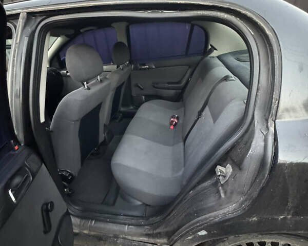 Черный Опель Астра, объемом двигателя 1.6 л и пробегом 240 тыс. км за 2500 $, фото 1 на Automoto.ua