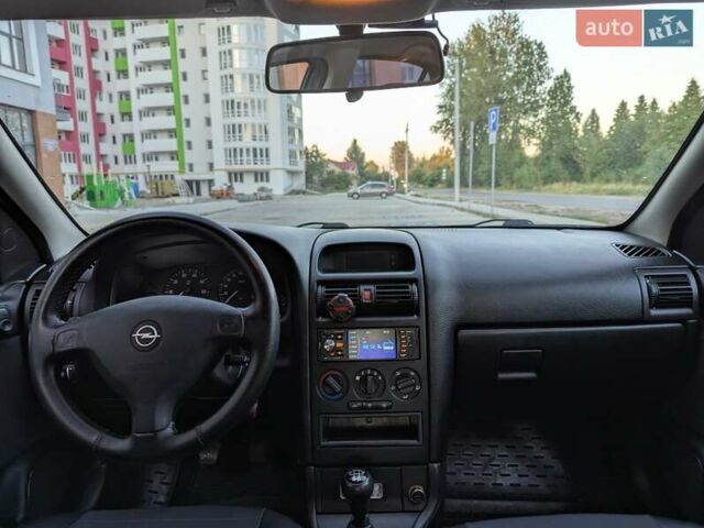 Черный Опель Астра, объемом двигателя 1.6 л и пробегом 215 тыс. км за 3900 $, фото 17 на Automoto.ua