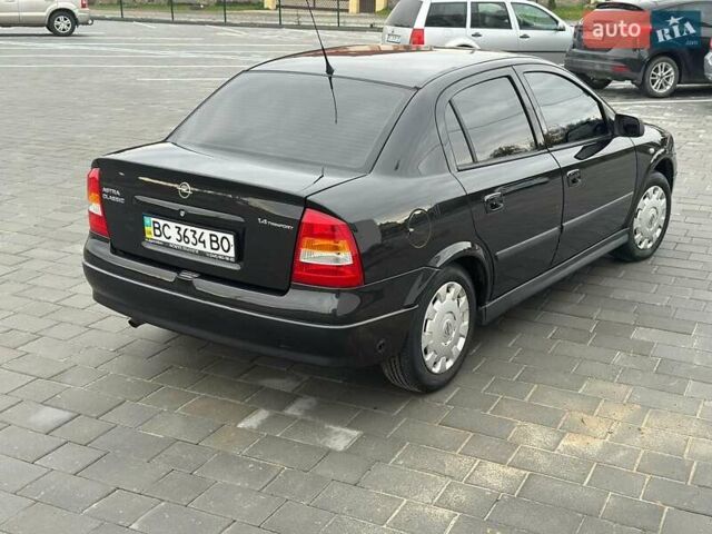 Черный Опель Астра, объемом двигателя 1.4 л и пробегом 216 тыс. км за 3999 $, фото 9 на Automoto.ua
