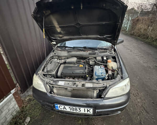 Черный Опель Астра, объемом двигателя 1.6 л и пробегом 240 тыс. км за 2500 $, фото 7 на Automoto.ua