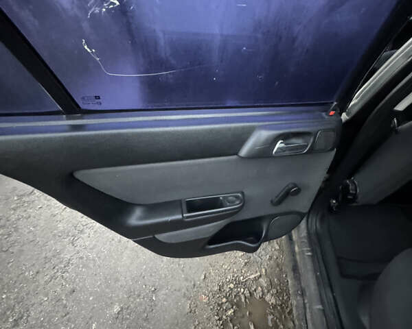 Черный Опель Астра, объемом двигателя 1.6 л и пробегом 240 тыс. км за 2500 $, фото 4 на Automoto.ua