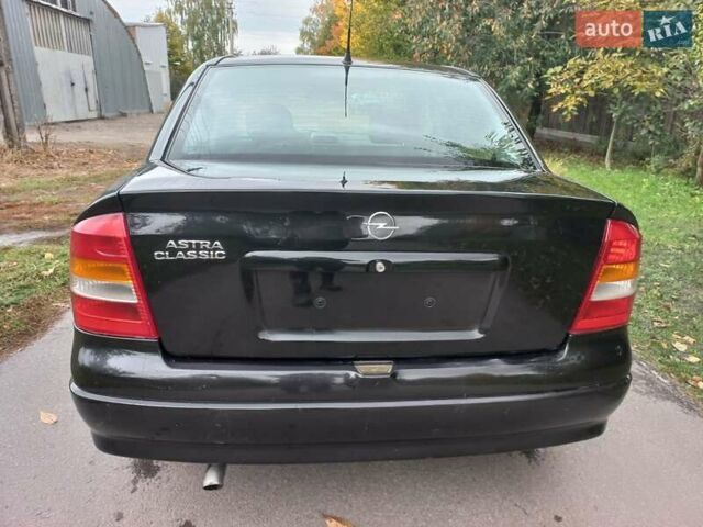 Черный Опель Астра, объемом двигателя 1.4 л и пробегом 220 тыс. км за 4500 $, фото 6 на Automoto.ua
