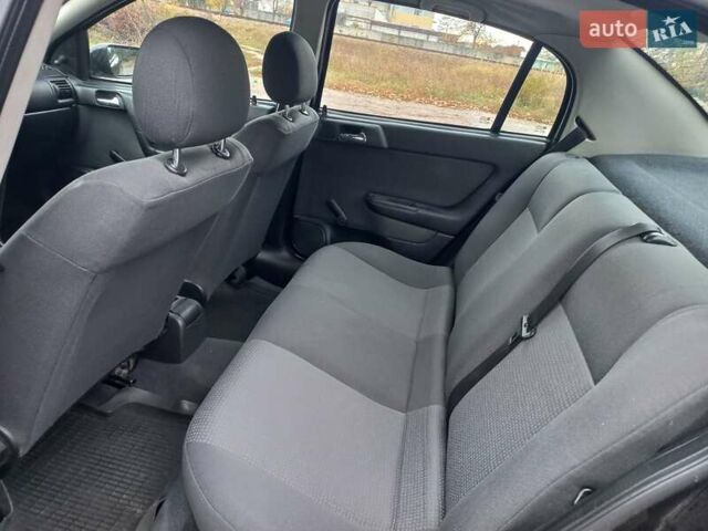 Черный Опель Астра, объемом двигателя 1.4 л и пробегом 230 тыс. км за 4500 $, фото 11 на Automoto.ua