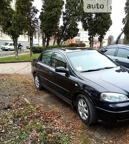 Черный Опель Астра, объемом двигателя 1.4 л и пробегом 155 тыс. км за 3500 $, фото 9 на Automoto.ua