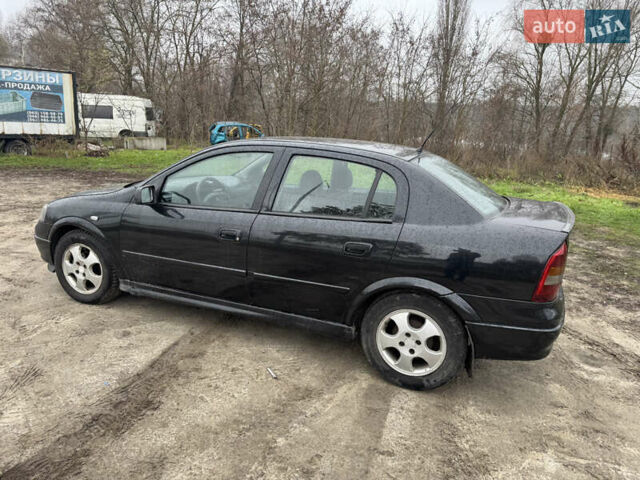 Черный Опель Астра, объемом двигателя 1.7 л и пробегом 300 тыс. км за 2999 $, фото 11 на Automoto.ua