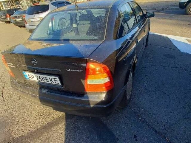 Черный Опель Астра, объемом двигателя 1.4 л и пробегом 169 тыс. км за 4650 $, фото 17 на Automoto.ua