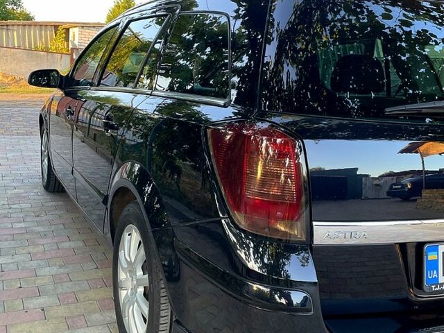 Черный Опель Астра, объемом двигателя 1.8 л и пробегом 234 тыс. км за 7700 $, фото 3 на Automoto.ua