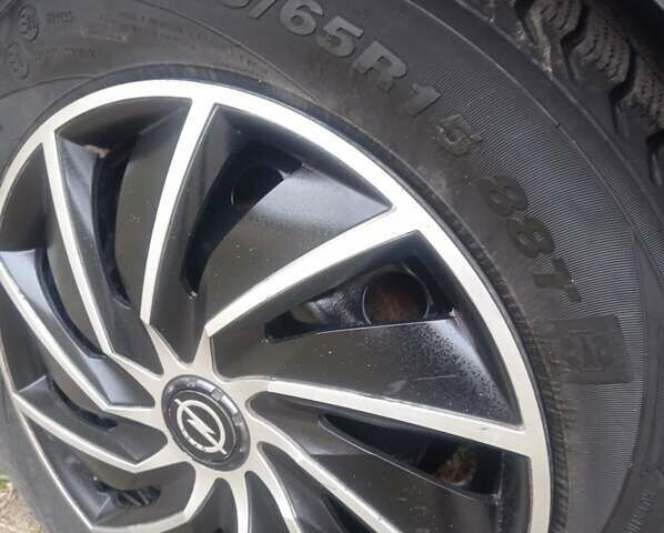 Черный Опель Астра, объемом двигателя 1.4 л и пробегом 340 тыс. км за 4100 $, фото 13 на Automoto.ua