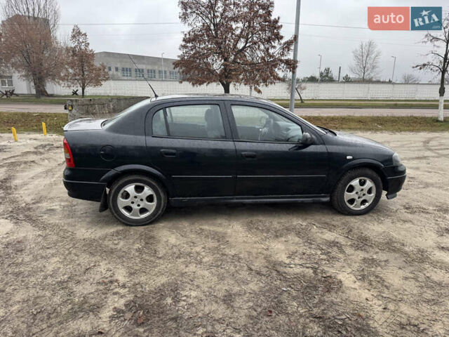 Черный Опель Астра, объемом двигателя 1.7 л и пробегом 300 тыс. км за 2999 $, фото 5 на Automoto.ua