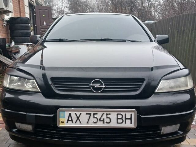 Черный Опель Астра, объемом двигателя 1.4 л и пробегом 362 тыс. км за 2600 $, фото 11 на Automoto.ua