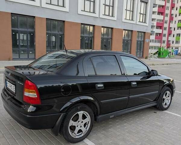 Черный Опель Астра, объемом двигателя 1.6 л и пробегом 215 тыс. км за 3900 $, фото 8 на Automoto.ua