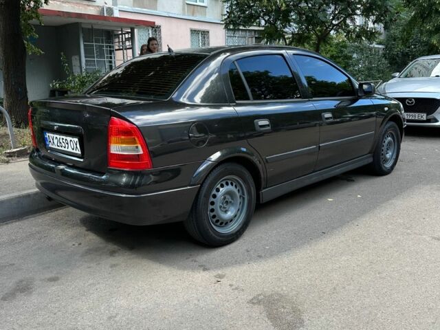 Черный Опель Астра, объемом двигателя 1.6 л и пробегом 137 тыс. км за 3700 $, фото 2 на Automoto.ua