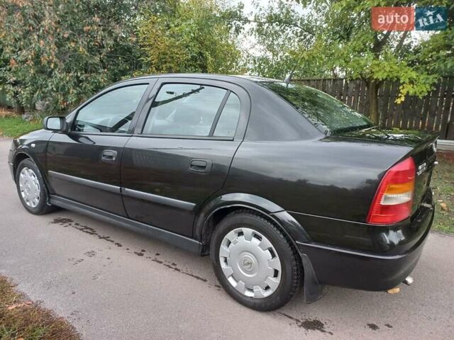 Черный Опель Астра, объемом двигателя 1.4 л и пробегом 220 тыс. км за 4500 $, фото 2 на Automoto.ua