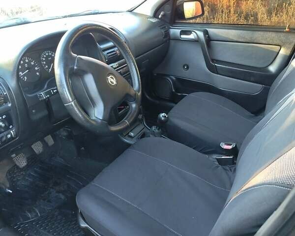 Чорний Опель Астра, об'ємом двигуна 1.4 л та пробігом 250 тис. км за 3200 $, фото 11 на Automoto.ua