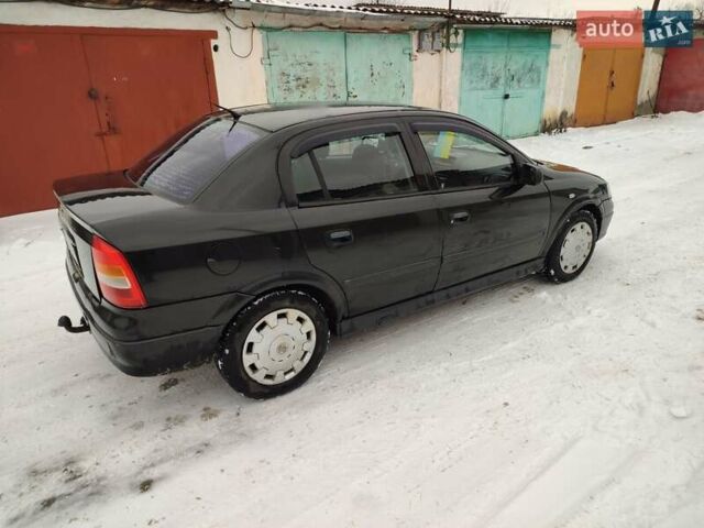 Черный Опель Астра, объемом двигателя 1.36 л и пробегом 300 тыс. км за 2150 $, фото 4 на Automoto.ua