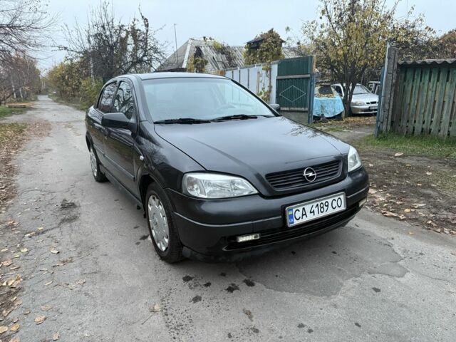 Черный Опель Астра, объемом двигателя 1.6 л и пробегом 250 тыс. км за 3750 $, фото 9 на Automoto.ua