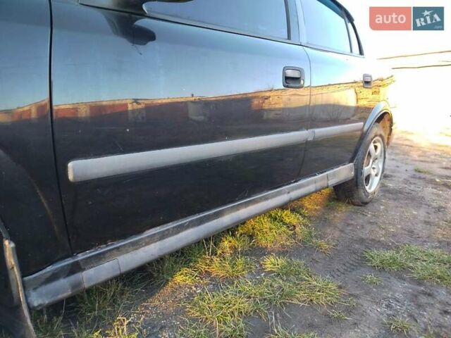 Чорний Опель Астра, об'ємом двигуна 1.4 л та пробігом 250 тис. км за 3200 $, фото 13 на Automoto.ua