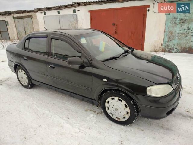 Черный Опель Астра, объемом двигателя 1.36 л и пробегом 300 тыс. км за 2150 $, фото 3 на Automoto.ua
