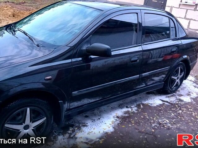 Черный Опель Астра, объемом двигателя 1.6 л и пробегом 256 тыс. км за 3300 $, фото 1 на Automoto.ua