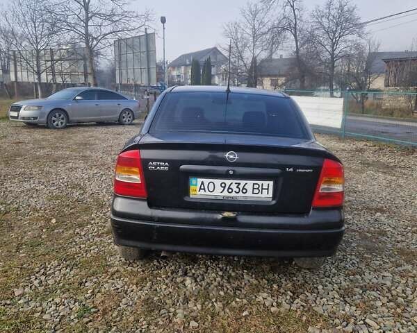 Черный Опель Астра, объемом двигателя 1.39 л и пробегом 180 тыс. км за 2550 $, фото 3 на Automoto.ua