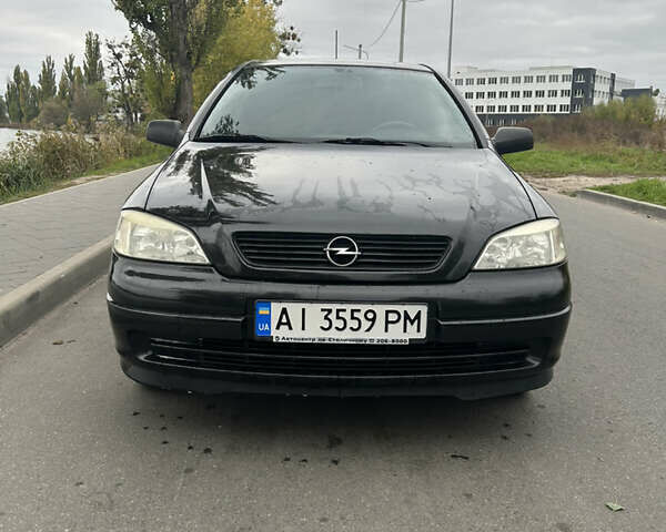Черный Опель Астра, объемом двигателя 1.36 л и пробегом 193 тыс. км за 3700 $, фото 1 на Automoto.ua