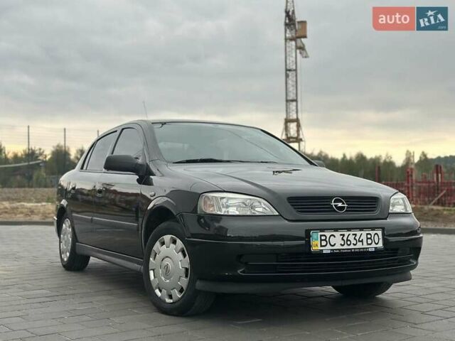 Черный Опель Астра, объемом двигателя 1.4 л и пробегом 216 тыс. км за 3999 $, фото 5 на Automoto.ua