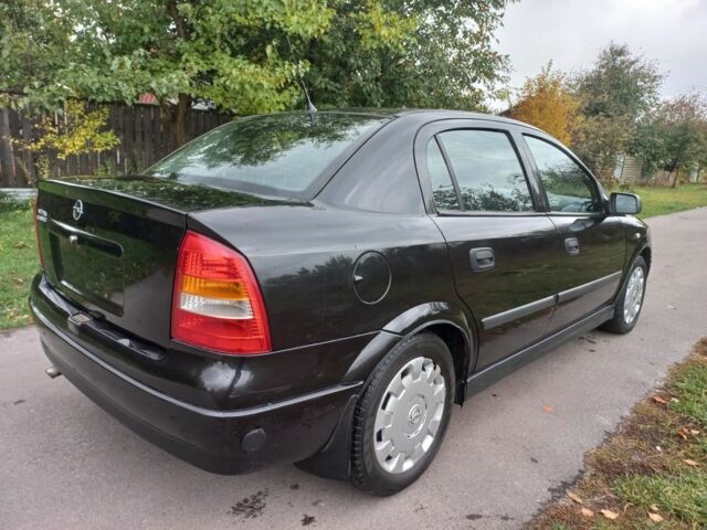 Черный Опель Астра, объемом двигателя 0 л и пробегом 220 тыс. км за 4500 $, фото 1 на Automoto.ua