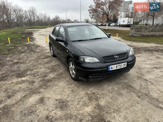 Черный Опель Астра, объемом двигателя 1.7 л и пробегом 300 тыс. км за 2999 $, фото 2 на Automoto.ua