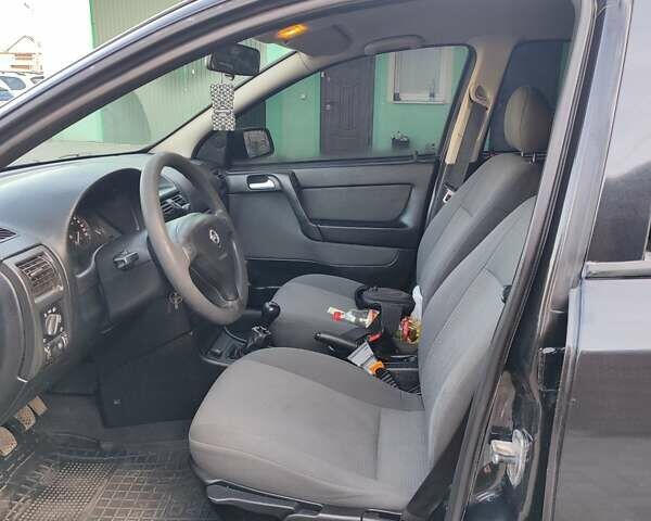 Черный Опель Астра, объемом двигателя 1.6 л и пробегом 100 тыс. км за 2800 $, фото 6 на Automoto.ua