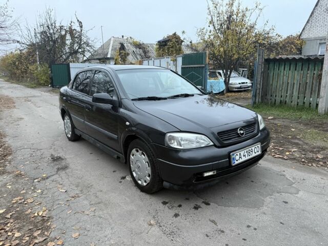Черный Опель Астра, объемом двигателя 1.6 л и пробегом 250 тыс. км за 3750 $, фото 8 на Automoto.ua