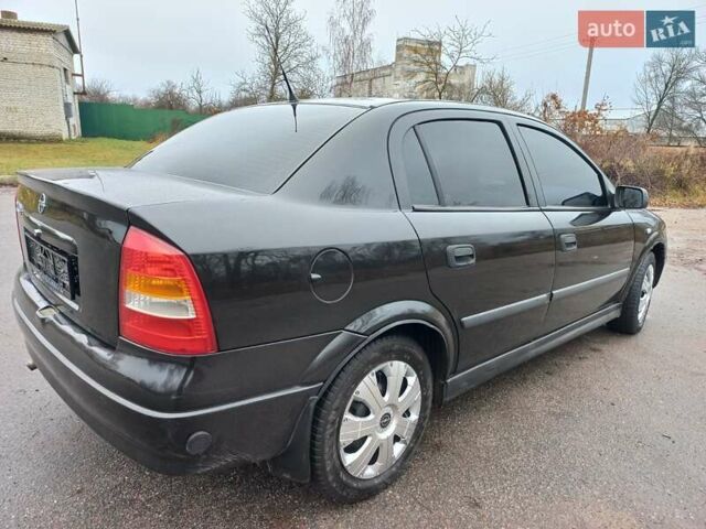 Чорний Опель Астра, об'ємом двигуна 1.4 л та пробігом 225 тис. км за 4350 $, фото 3 на Automoto.ua