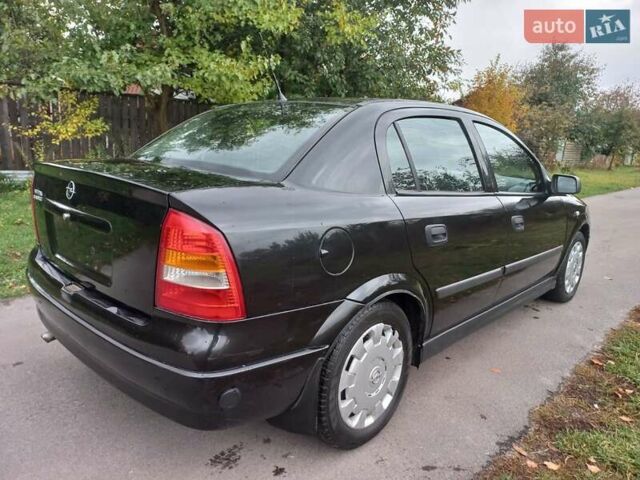 Черный Опель Астра, объемом двигателя 1.4 л и пробегом 220 тыс. км за 4500 $, фото 4 на Automoto.ua