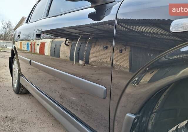 Чорний Опель Астра, об'ємом двигуна 1.6 л та пробігом 52 тис. км за 5600 $, фото 12 на Automoto.ua