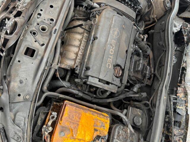 Черный Опель Астра, объемом двигателя 1.6 л и пробегом 1 тыс. км за 750 $, фото 7 на Automoto.ua