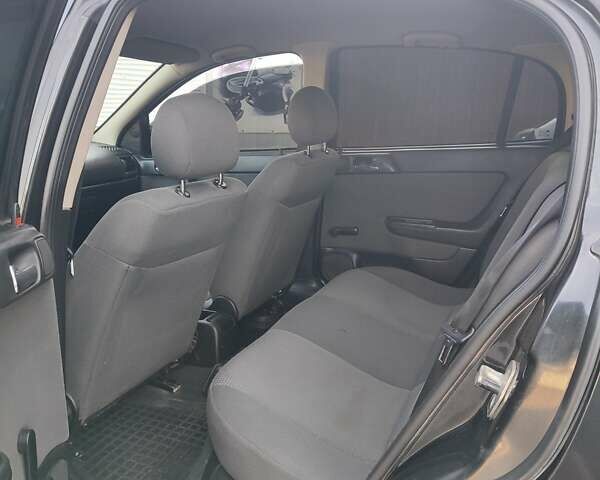 Черный Опель Астра, объемом двигателя 1.6 л и пробегом 100 тыс. км за 3300 $, фото 7 на Automoto.ua
